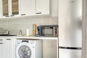 Ảnh trong thư viện ảnh của Studio Moderne avec jardin et garage ở Nanterre