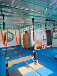 a gymnasium with a bunch of trampols at Yes Retreat Rishikesh in Rishīkesh