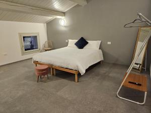 Postel nebo postele na pokoji v ubytování Palazzo Glicine