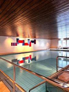 a large swimming pool with a pool at FeWo Bergruh 922 im Ferienpark Oberallgäu in Missen-Wilhams