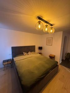 En eller flere senge i et værelse på IUGAs RESIDENCE