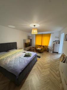 En eller flere senge i et værelse på IUGAs RESIDENCE