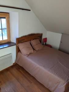 Postel nebo postele na pokoji v ubytování Maison des lacs