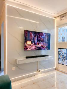 TV/trung tâm giải trí tại Beautiful Spaces Haven a 3 bedroomed stand alone