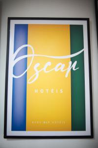 een foto van een lijst met het woord escape hotels bij HOTEL OSCAR GOLD in Montes Claros