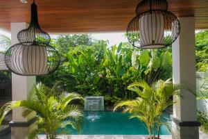 En have udenfor Villa Niang Ando