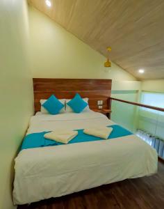 Postel nebo postele na pokoji v ubytování The Cliffhouse Samboan