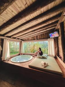 Et tv og/eller underholdning på Pousada Flor de Lótus dos Canyons