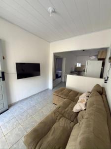 TV/trung tâm giải trí tại Casa de Praia no Centro de Japaratinga - AL