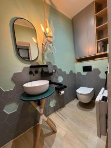 Et badeværelse på AMA Apartment