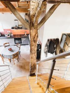 Kuchyň nebo kuchyňský kout v ubytování La Chouette - Ancienne grange entièrement rénovée 4 personnes