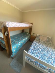 En eller flere senge i et værelse på Depto completo hasta 5 personas + 13 billeder