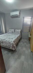 Postel nebo postele na pokoji v ubytování 2 Bedrooms with Kitchen, Living Room