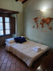 Giường trong phòng chung tại la casa nel borgo