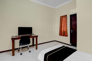 Et tv og/eller underholdning på Capital O 95046 Gefa Sleep N Go + 22 billeder