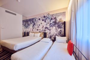 En eller flere senge i et værelse på a&o Manchester City Centre