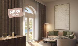 een woonkamer met een bank en een raam bij Aminess Younique Korcula Heritage Hotel in Korčula +57 foto's