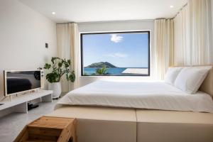 TV a/nebo společenská místnost v ubytování Hyupjae Hyun Stay