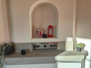 a toy kitchen with a red lantern in a shelf at Frutigen 20 nach Interlaken in Frutigen +32 photos