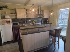 a kitchen with a sink and a counter top at Ferienwohnung Salza in Nordhausen