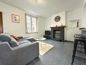 Khu vực ghế ngồi tại Charmante maison centre village