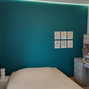 Giường trong phòng chung tại Chambre campagne uxelloise