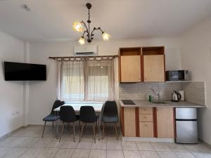 Køkken eller tekøkken på Oneiro Apartment