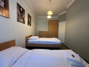 En eller flere senge i et værelse på Aparthotel Mariazellerhof