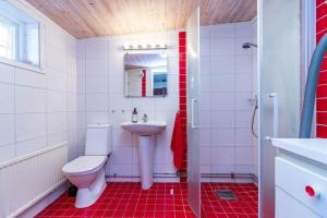 a white bathroom with a toilet and a sink at BLE885-Ramdala-Ormen-langes-vaeg-10 in Ramdala +5 photos