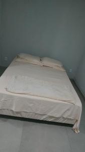 Giường trong phòng chung tại Residencial Bella Home