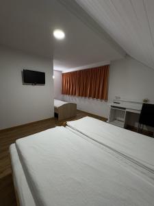 Et tv og/eller underholdning på Landgasthof zum Zimmermann + 45 billeder