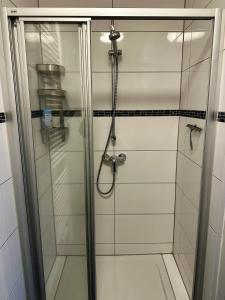 Et badeværelse på Zentrales Hansa Komfort Apartment