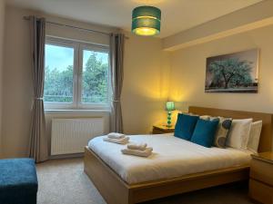 Giường trong phòng chung tại AB11 Apartments - Portland Street