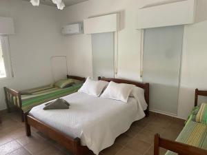 Postel nebo postele na pokoji v ubytování Casa de campo Los Ombues + 31 fotografií