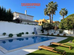 a swimming pool in the backyard of a villa at Casa di Campara Almada Villa in FAO