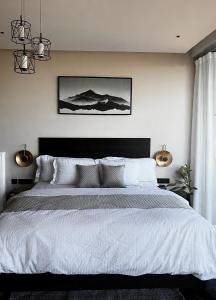 Giường trong phòng chung tại Avatara