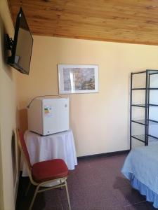 Et tv og/eller underholdning på Hotel Colonial Maule Villa Alegre