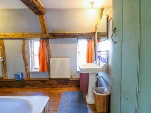 a bathroom with a sink and a mirror at Town Farm in Eye +49 photos