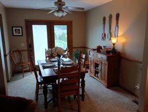 a dining room with a table and chairs and a dining room at Poplar Estate in Lincoln