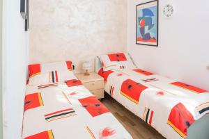 Giường trong phòng chung tại CASA DIAMANTE - Regarda Travel +25 ảnh