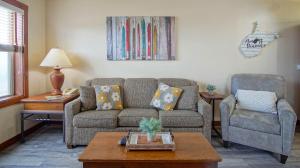 a living room with a couch and two chairs at Rimfire 151- 152 Unique 2 Br Condo in Snowshoe
