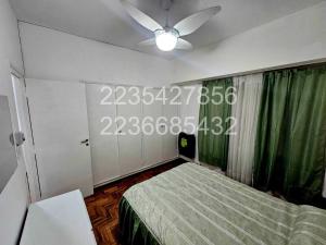 Giường trong phòng chung tại Departamento 2 Amb - PLAZA COLON