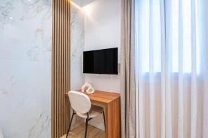 Et tv og/eller underholdning på Garbo Hôtel