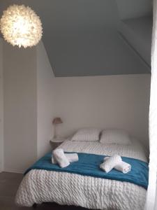 Postel nebo postele na pokoji v ubytování Le Ty Breizh