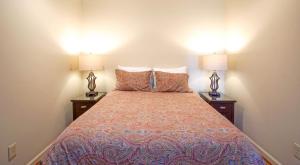 a bedroom with a bed with two lamps on it at Stemwinder 6B 1 Bedroom, 1 Full Bath, Slope Side in Slaty Fork