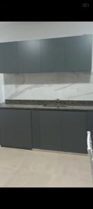 a view of a glass table with a counter top at Loft Urbano Pilar in Del Viso