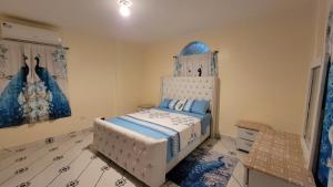 Postel nebo postele na pokoji v ubytování Descansa sin prisas a minutos del Aeropuerto