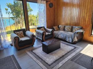 Et opholdsområde på Cabaña y Tinaja Playa Chaiguao