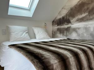 En eller flere senge i et værelse på L'Augustine - Le Cuchet