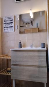 a kitchen counter with a sink in a room at Gite N 4 du Bas Coudreau in Rosnay +27 photos